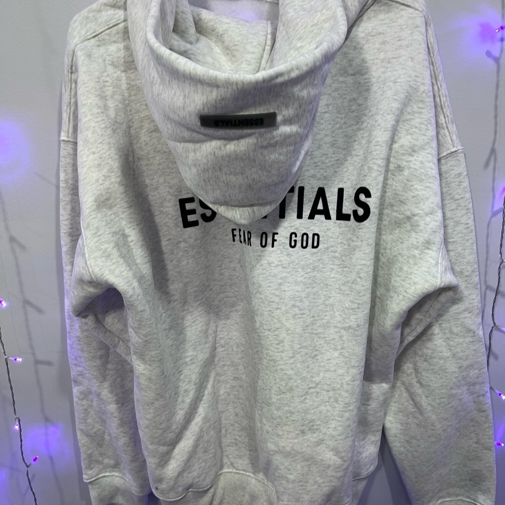 Never worn brand new essentials hoodie